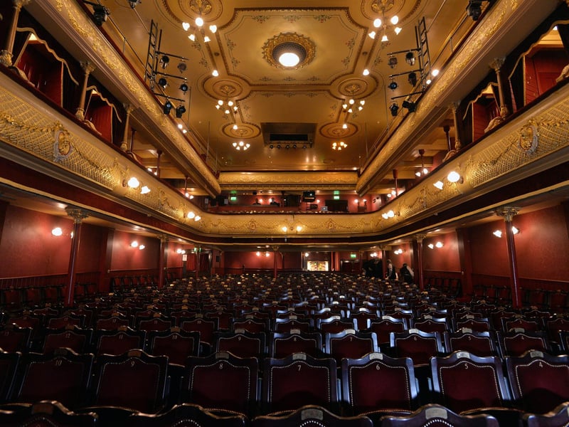 Leeds' historic City Varieties hosts several spirits, but its most famous resident is The White Lady. Believed to be a former vocalist, she appears before opening night wearing a white crinoline dress. Far from terrifying, performers consider a sighting of her to be good luck for the show's run.