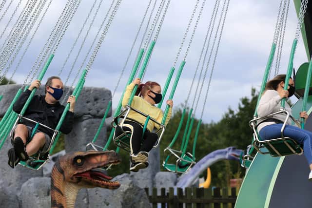 Children enjoying the paraglider ride at the theme park, which is based just outside Sheffield in Rotherham. Picture: Chris Etchells