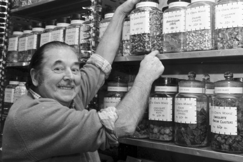 Jimmy Casey, owner of the world-renowned Casey's sweet shop in St Mary's Street Edinburgh, with their own-brand sweets in December 1985.