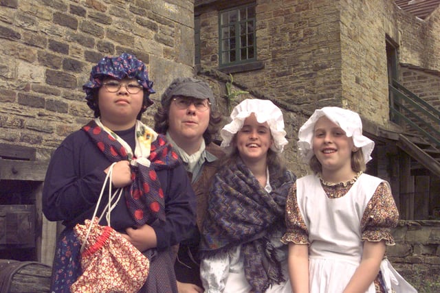 Pictured at the Abbeydale Industrial Hamlet in 1999, where children dressed for the opening day. Seen LtoR are,  Sany Tse 10, Paula Bridge a Freelance Educator, Catherine Black 10, and Amy Sutton 10