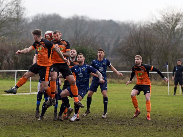 Joe Byron and Danny Bell are pictured in the thick of the action.