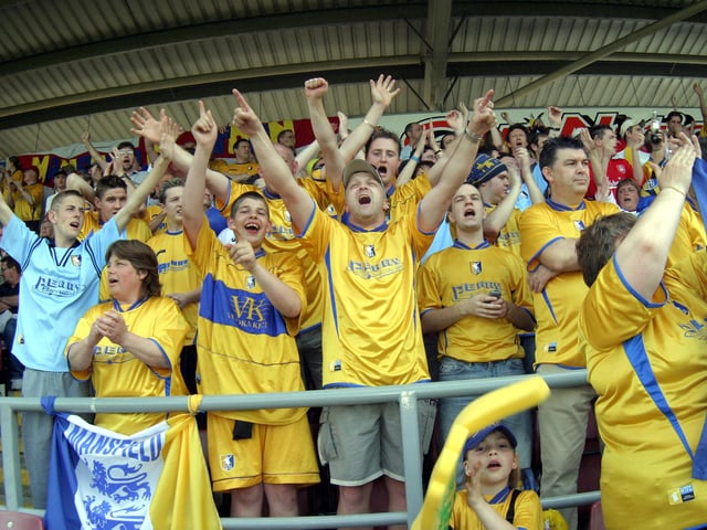 The Stags faithful cheer on their team in the play-off semi-final against Northampton Town.