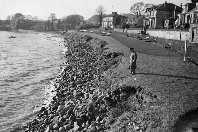 Inspecting the shoreline which, even back then, sparked fears it was eroding ...