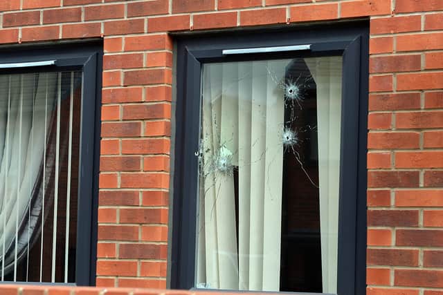 Bullet holes can be seen in the window of a house on Errington Avenue, Arbourthorne, Sheffield