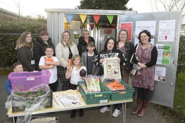 Volunteers at Arbourthorne Primary School's Community Fridge get ready to hand out food to local residents from their facility in the school grounds