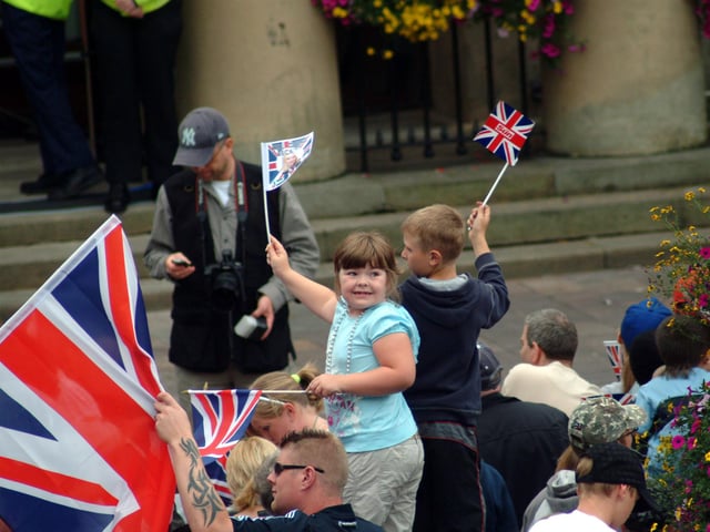 Young fans waiting for a glimpse of their swimming hero