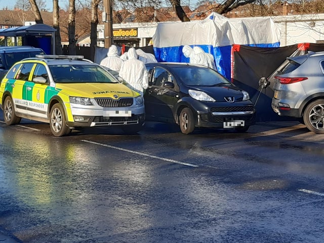 Police at the scene of the alleged murder on Wath Road Mexborough today. The alleged shooting  happened on January 11