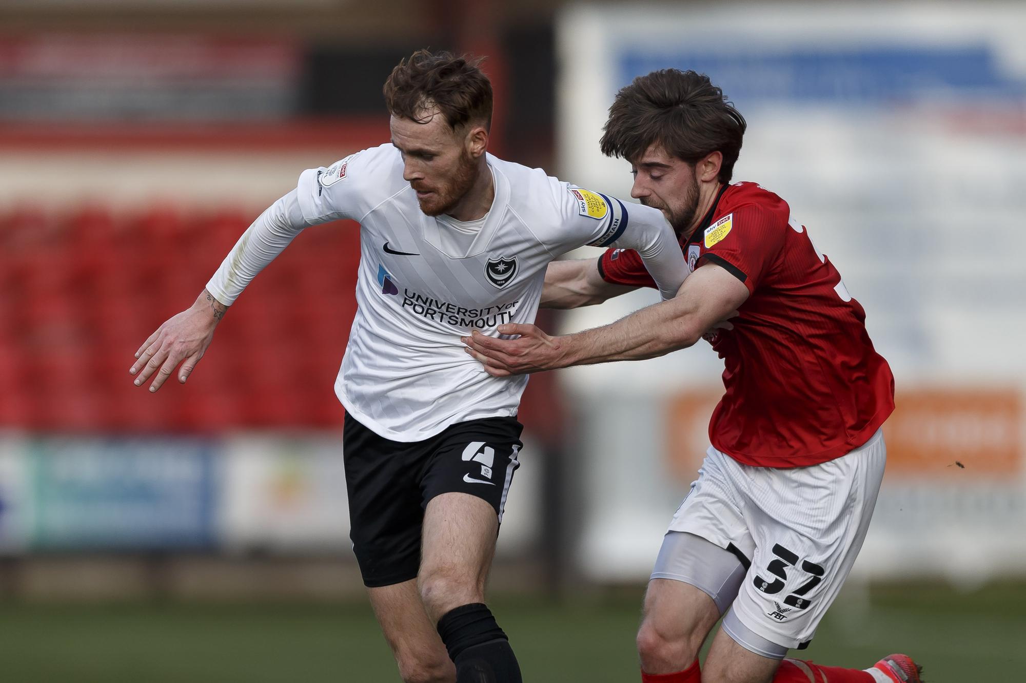 Tom Naylor battles with Antony Evans for the ball.  Picture: Daniel Chesterton/phcimages.com