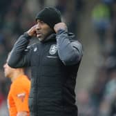 Ex-Sheffield Wednesday manager Darren Moore has been sacked by Huddersfield Town