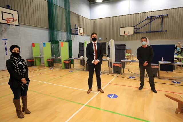 A tour around Yewlands Academy with Bob Johnson and Abtisam Mohamed from Sheffield City Council ahead of the school opening to pupils next week. They are pictured with Head Teacher Andy Kelly in the sports hall which has been turned into a covid testing area. Picture: Chris Etchells