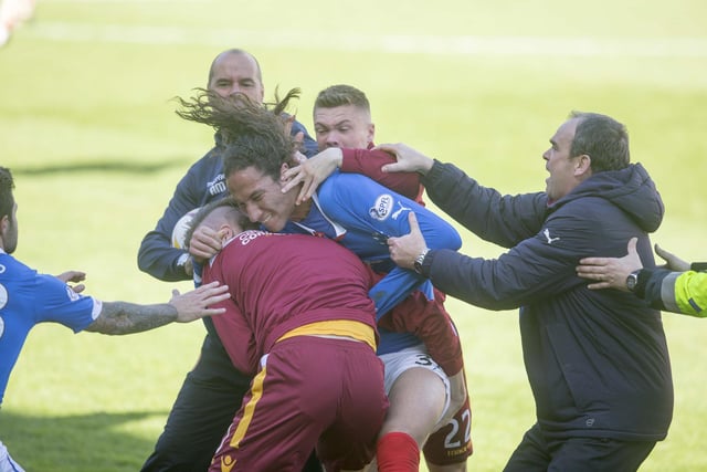 Bilel Mohsni of Rangers clashes with Motherwell players during the Scottish Premiership play-off final second leg at Fir Park on May 31, 2015. (Photo by Jeff Holmes/Getty Images)