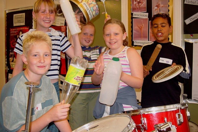 Around 40 children, aged 11 and 12 years, made their musical mark with the help of a load of spoons, empty pop bottles and biscuit tins at the performing arts 
summer school at Myrtle Springs School, East Bank road in 2002