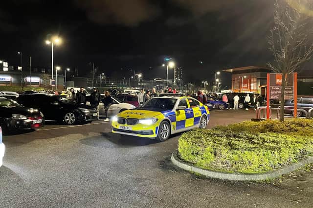Car enthusiasts gathered on the car park of B&Q on Queens Road, Sheffield, last night - attracting the attention of the police