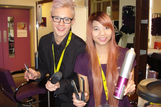 Buxton and Leek College advanced hairdressing students Cerne Webster-Price and Sukanta Thongdonnoi in 2014