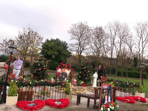 Willy Collins' widow Kathleen said she spent three days decorating his final resting place for Christmas