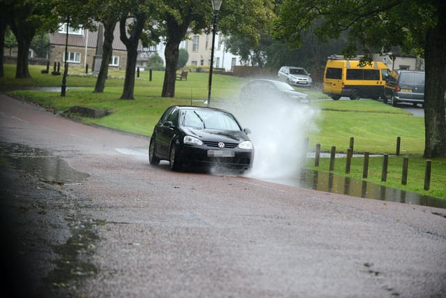 Driving through standing water in Front Street, Cleadon