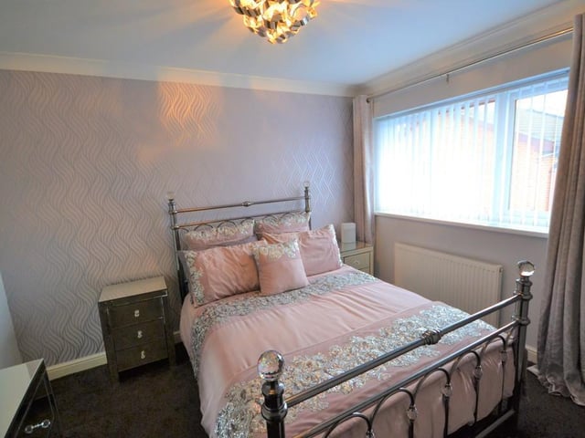 A beautifully presented front facing double bedroom with a upvc double glazed window, various power sockets, central heating radiator and coving complements the ceiling.
