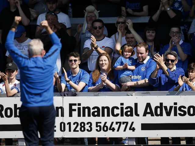 Barry Harris gees up the crowd before kick-off.