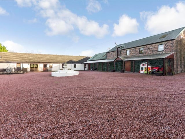 Rear of property with stable block.