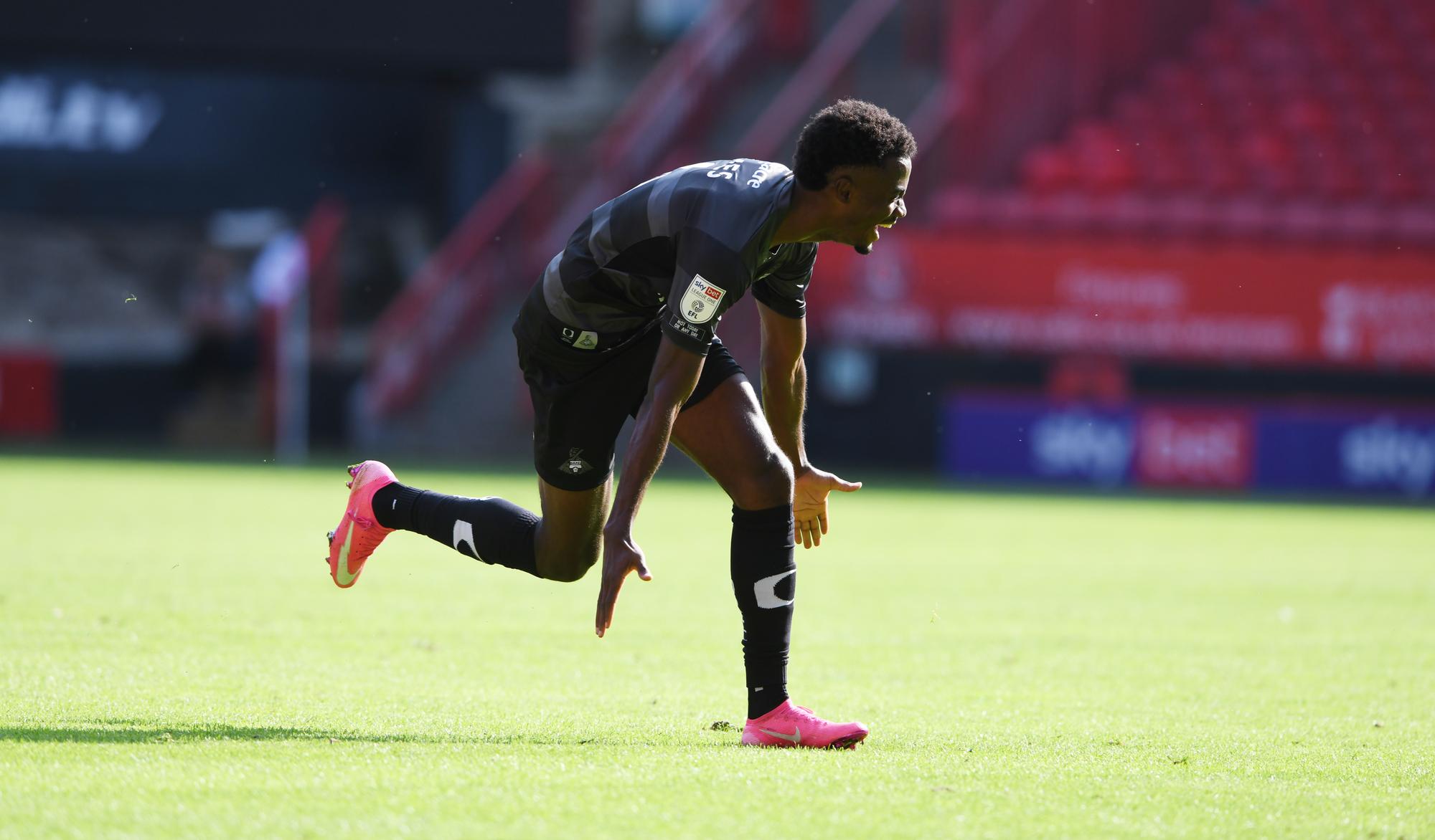 Madger Gomes celebrates his goal against Charlton Athletic