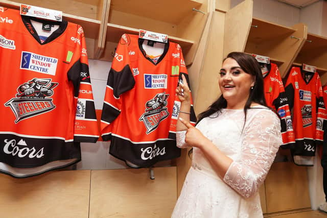 Emily Hurst in the Steelers changing room after getting married earlier that day