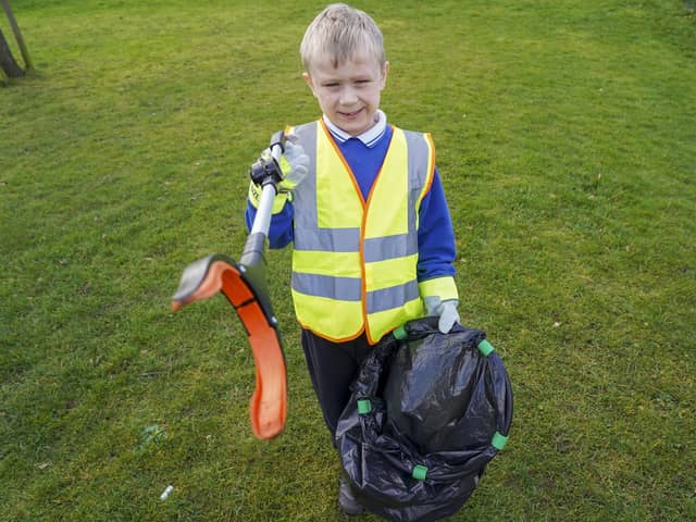 Archer Harris, 7, asked for a litter picking set from Santa last Christmas.