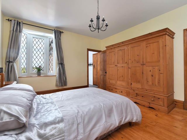 There are five bedrooms in the house.