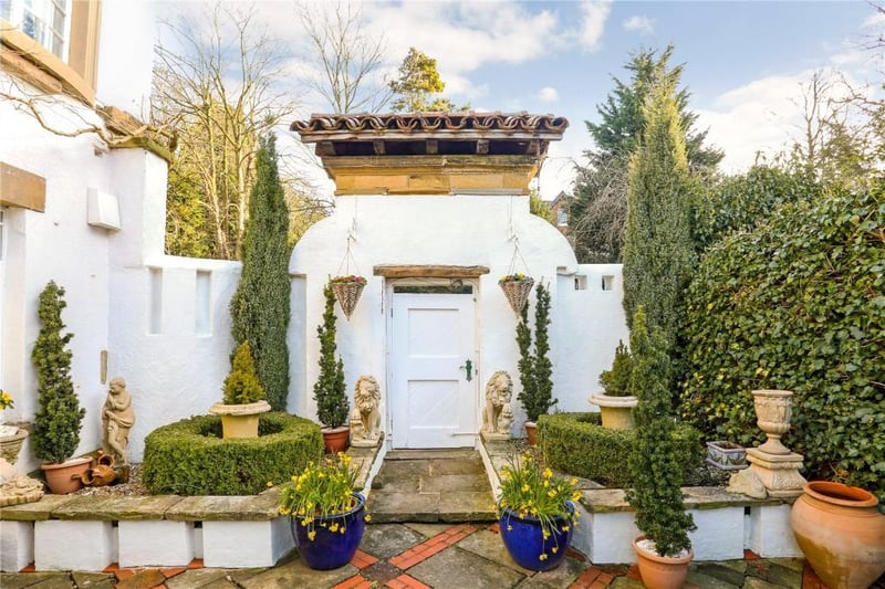 There is an immaculate courtyard garden leading from the conservatory and winding down to the lower ground floor.