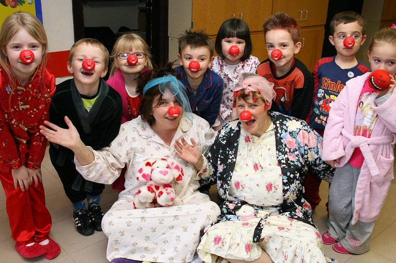 Ripley Infant School children and staff celebrate Red Nose Day in their pyjamas in 2009.