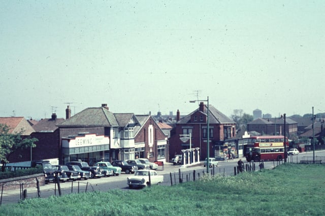 A view of Hart Lane at its junction with Serpentine Gardens showing Leeming Garage.