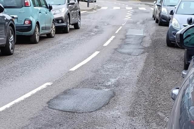 Roads firm Amey only repairs ‘hazardous’ potholes and ignores others - which is ‘unacceptable’, Coun Masters says.
