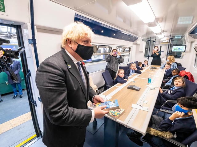 The Prime Minister met with children from St Roch's Primary School whilst visiting Glasgow Central to view the green trains.