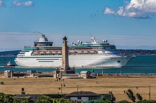 Majesty of the Seas passing the naval war memorial on Southsea Common
