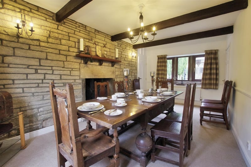 Double-glazed window to the front and rear, exposed stone wall, multifuel stove set in an inglenook fireplace and ceiling beams.