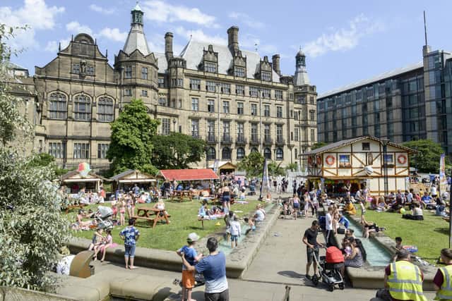 Sunshine worshippers enjoy the hot weather in the Peace Gardens in Sheffield