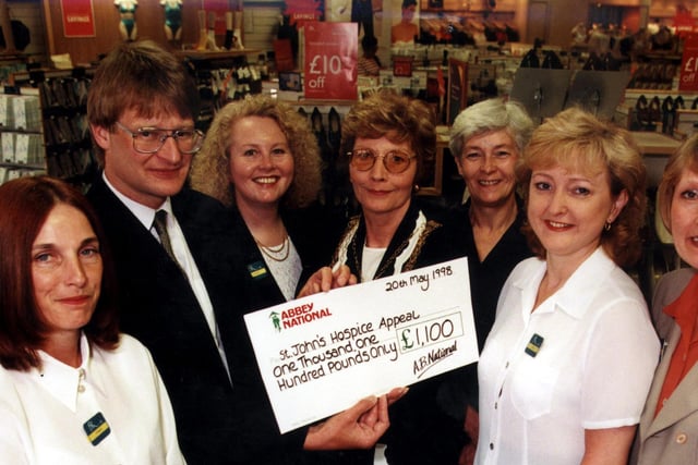 Doncaster Mayor Coun Yvone Woodcock and Mark Toseland (trustee of St John's Hospice) collected a £1,100 cheque from BHS staff Angie Nicholson, Angie Taylor, Anne Fisher, Pat Henaghan and Linda Hall in 1998