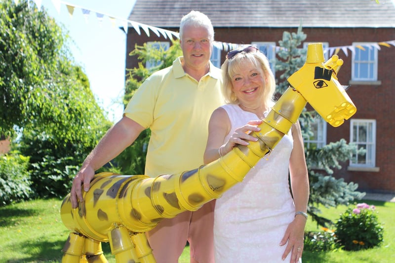 Russel and Angela Barker with their contribution to Palterton's Flower Pot Festival.