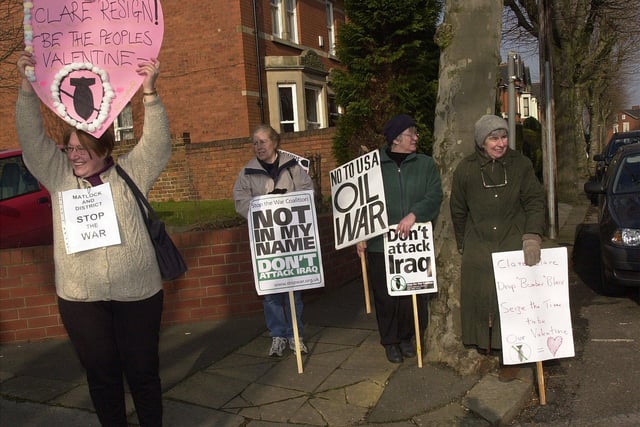 Anti-war protesters wait to hand a Valentine's Card to MP Clare Short,  the Secretary of State for International Development, as she opens the new Labour Party HQ in Chesterfield in 2003.