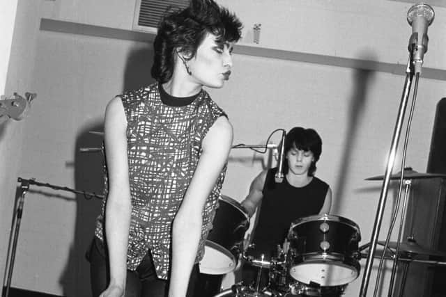 Siouxsie Sioux playing up to Pete Hill's camera at the Limit in Sheffield