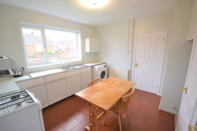 A good sized breakfast kitchen having a range of white base units with contrasting worktops, there is space for a free standing cooker, space and provisions for a washing machine, stainless steel wash bowl, two useful storage cupboards and a side door opens to the conservatory.
