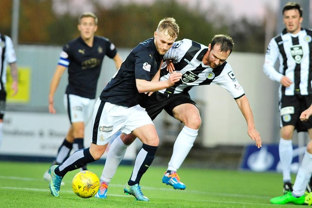 Andy Webster tries to shut down one of several key players for Falkirk.
picture: Alan Murray