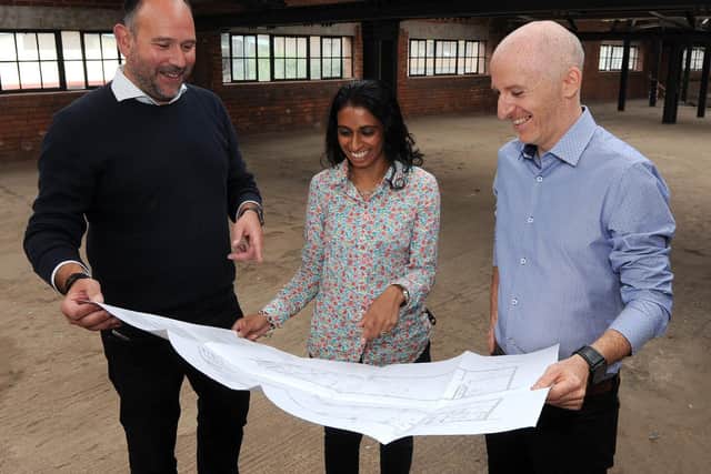 Matt Bigland, right and wife Nina Patel-Bigland discuss the Cutlery Works with agent Tim Bottrill in 2018. Picture: Andrew Roe