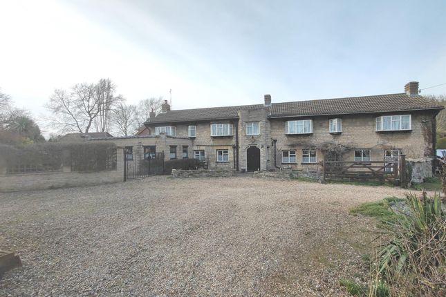 This property boasts a large driveway and is situated on a good sized plot of approximately half an acre.