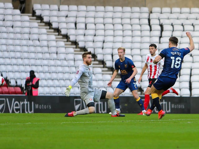 Mansfield Town forward Rhys Oates grabs an early goal.