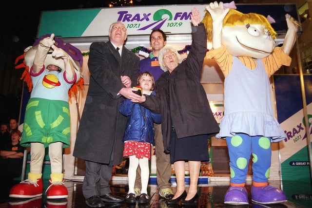 Rugrats Chuckie and Angelica join the Mayor of Doncaster, Councillor Margaret Robinson, Yorkshire Cable's Eric Elkington (second left) and six year-old Branton schoolgirl Olivia Brabazon at the town centre Christmas lights switch on in 1999
