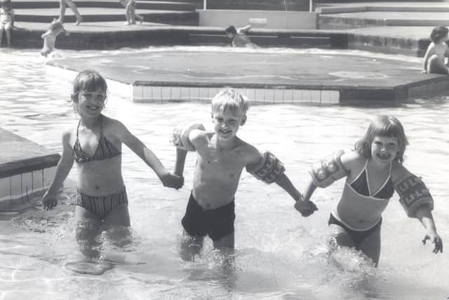 Children enjoying the old pool in the 1970s.