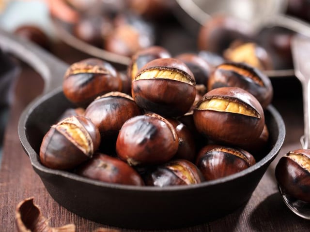The wafting smell of hot roast chestnuts comes round every festive season, with chestnuts also ranking in the third tier (Photo: Shutterstock)