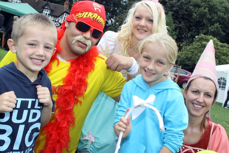 Joseph Fowkes (5) and Lauren Haslam (10) with Adam Rowley, Lisa Whitehouse and Amanda Asher from Phoenix Enterprises at Party in the Park in Chesterfield's Queen's Park in 2010.