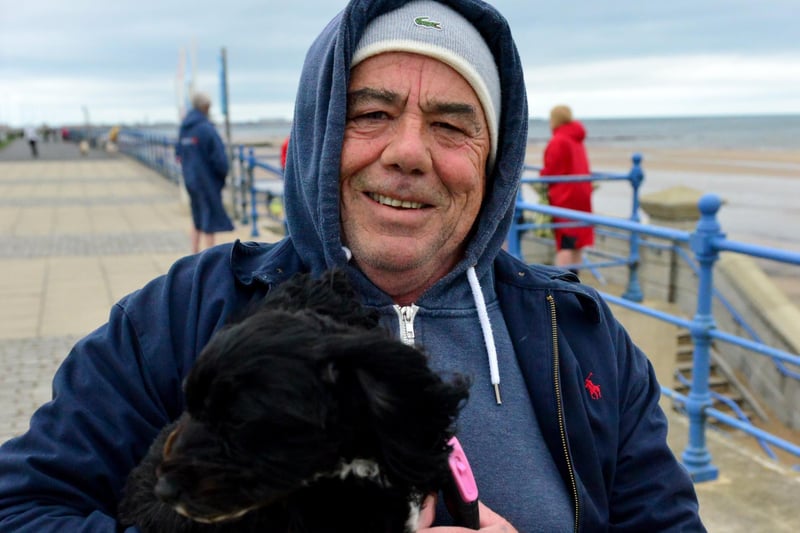 Coco with her owner Ken Smith. Picture by Frank Reid