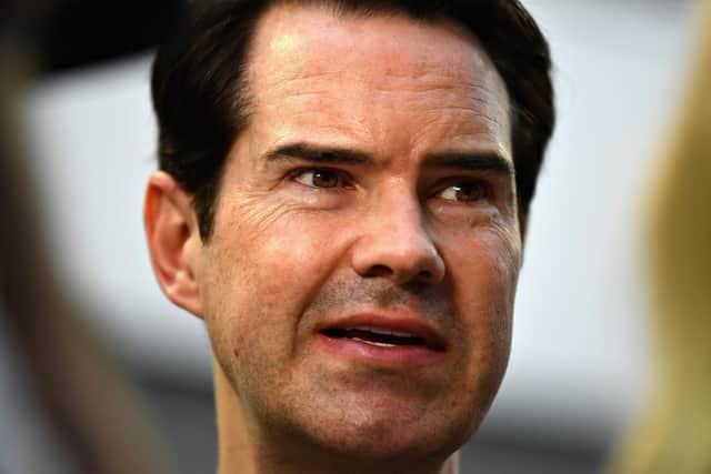 SINGAPORE - SEPTEMBER 16:  British comedian Jimmy Carr looks on in the Paddock before the Formula One Grand Prix of Singapore at Marina Bay Street Circuit on September 16, 2018 in Singapore.  (Photo by Clive Mason/Getty Images)